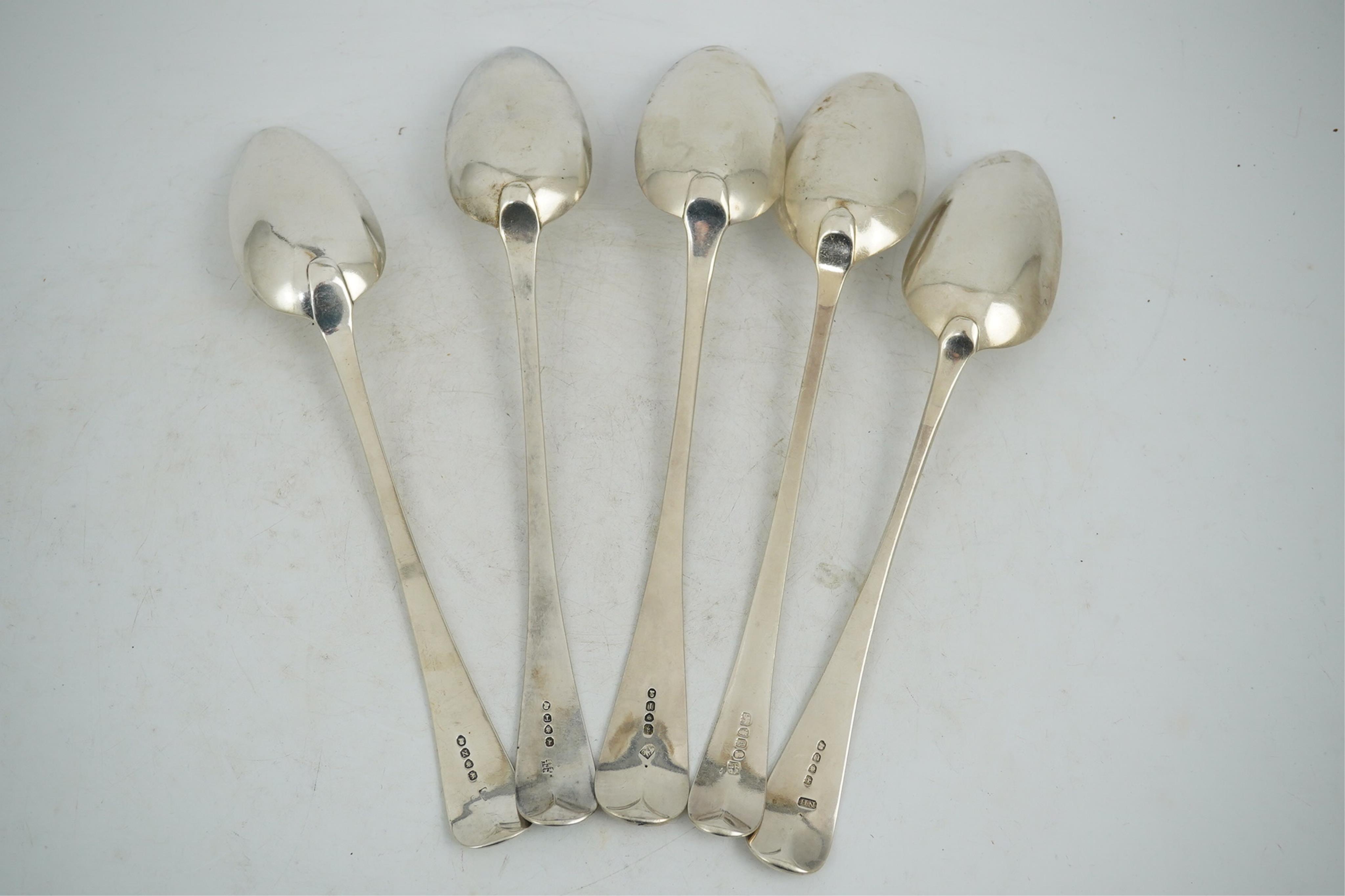 Five assorted late 18th/early 19th century silver Old English pattern basting spoons, various dates and makers, earliest Smith & Fearn, London, 1797, latest London, 1825, 18.5oz.